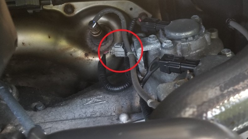 Burnt oil smell under the hood